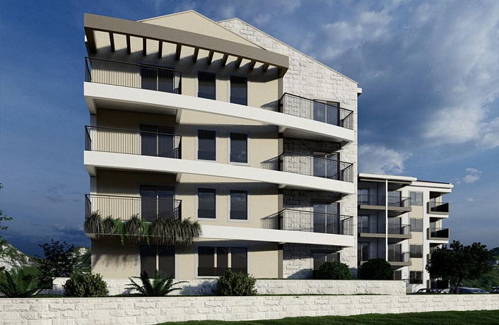 Apartments in a building under construction with a swimming pool in Budva